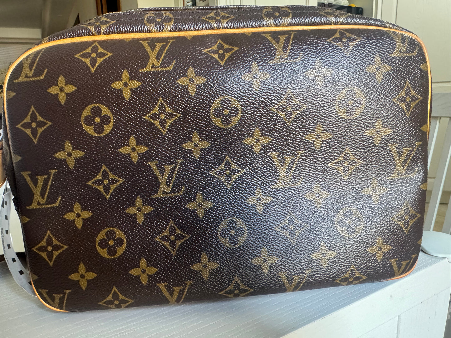 Louis Vuitton Report PM