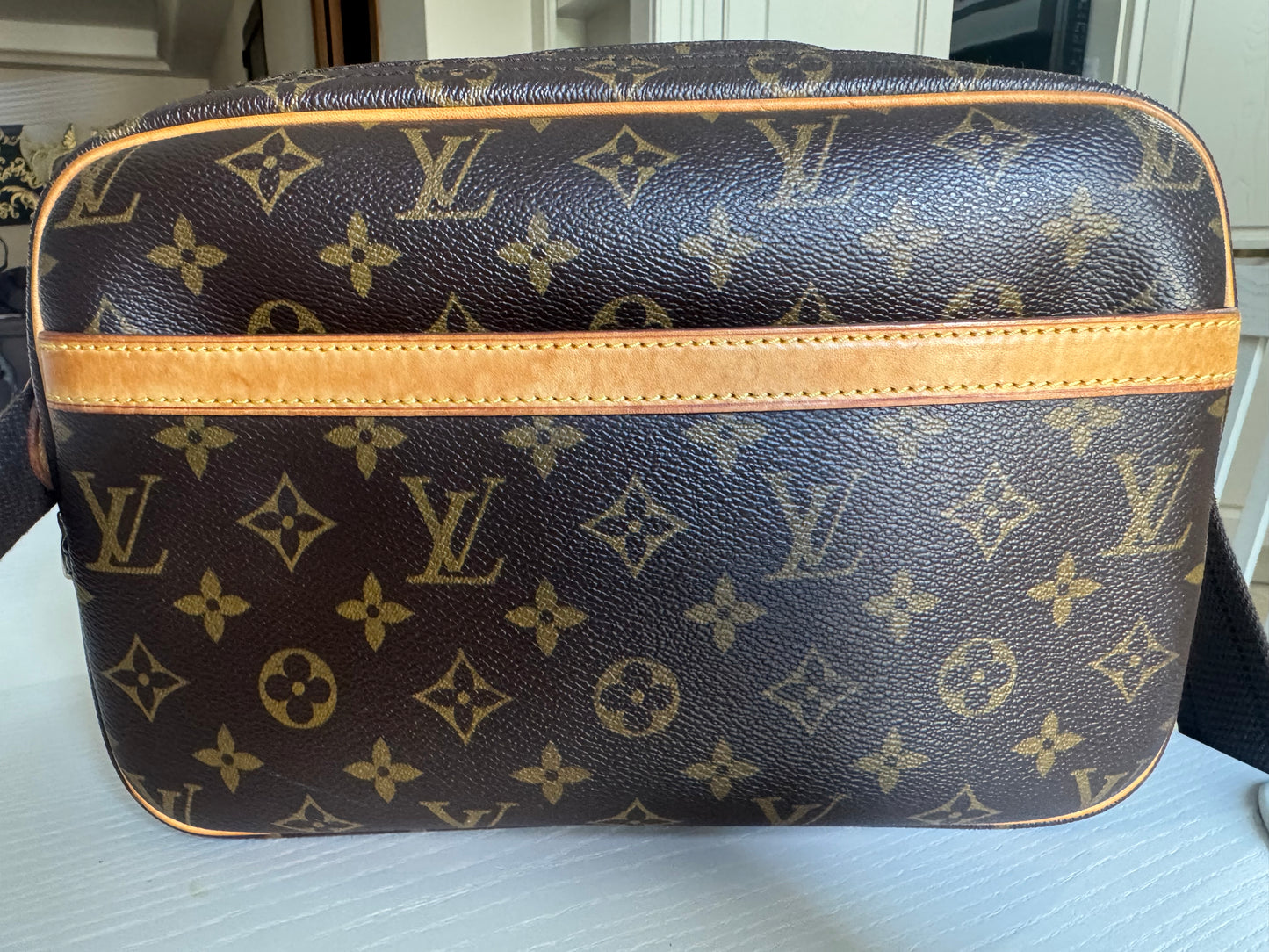 Louis Vuitton Report PM